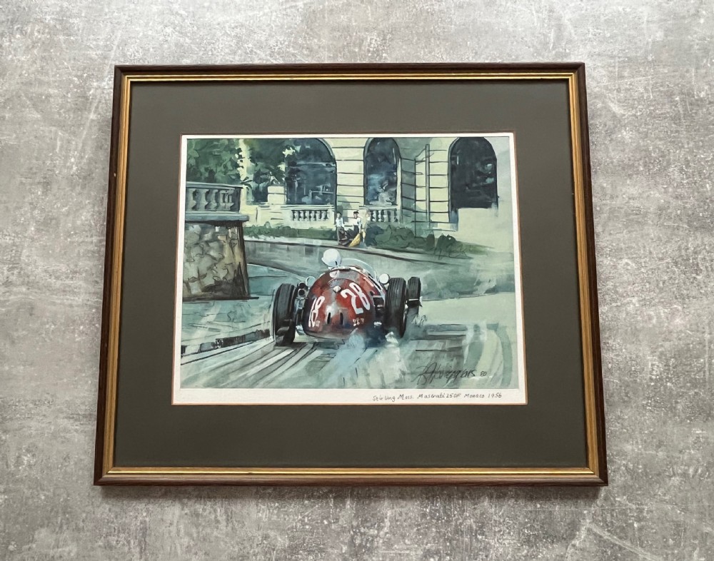framed print stirling moss in a 250f maserati