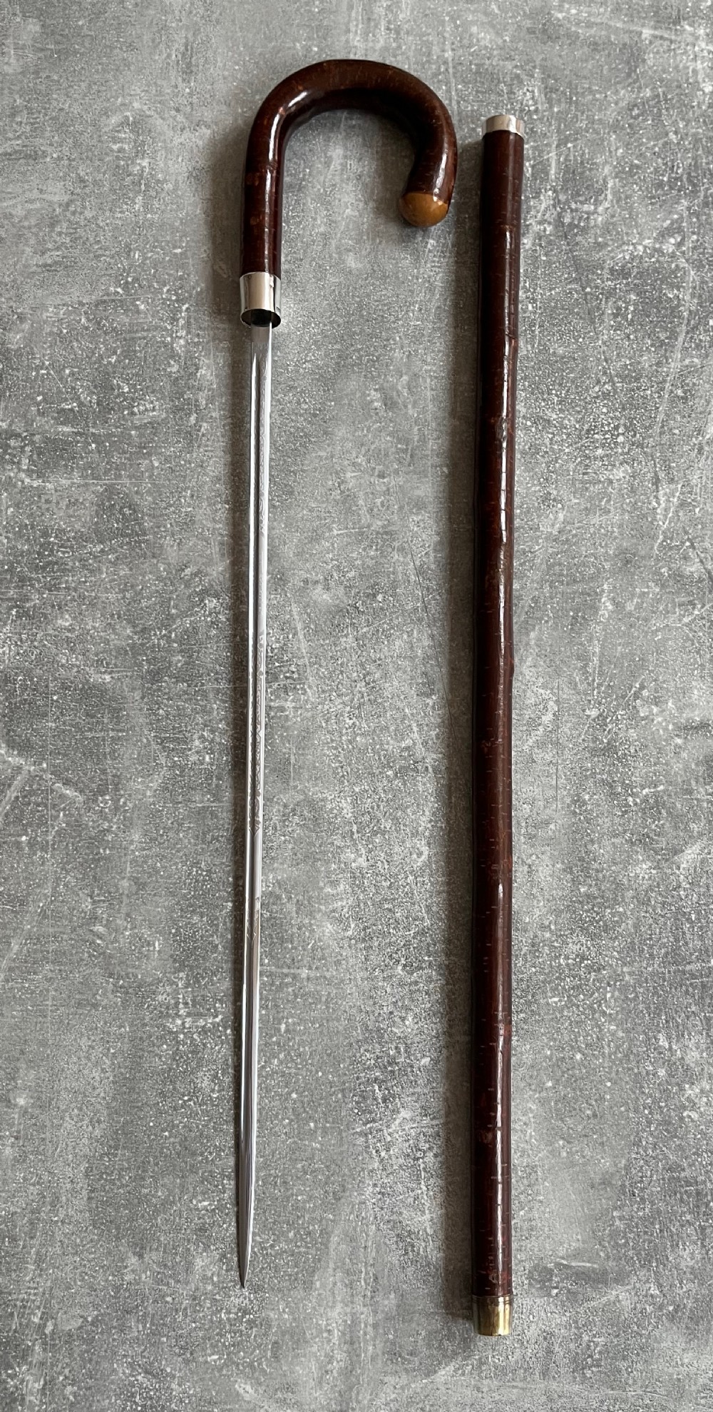 crook handled cherrywood sword stick with silver mounts